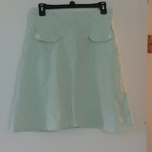 Green and white skirt